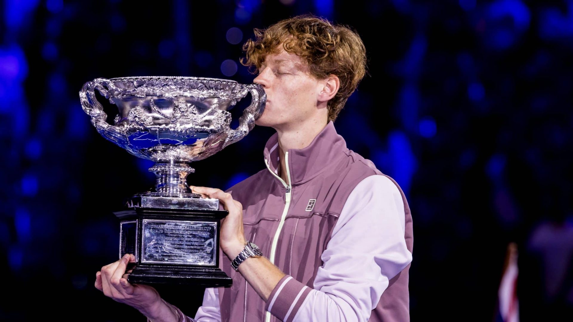 MELBOURNE, VIC - JANUARY 28: Jannik Sinner of Italy poses for photos with his trophy after winning the finals of the 2024 Australian Open on January 28 2024, at Melbourne Park in Melbourne, Australia. (Photo by Jason Heidrich/Icon Sportswire via Getty Images)